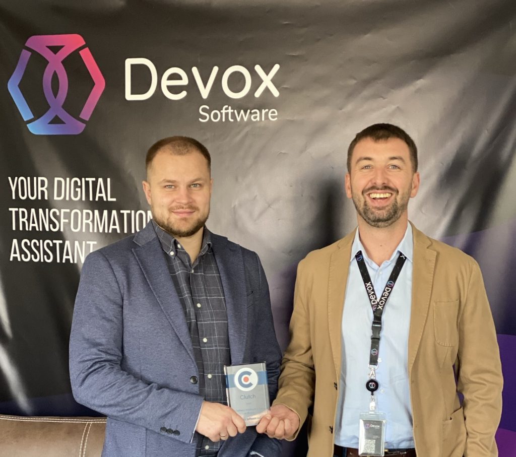 Devox Software top management with Clutch Leader award